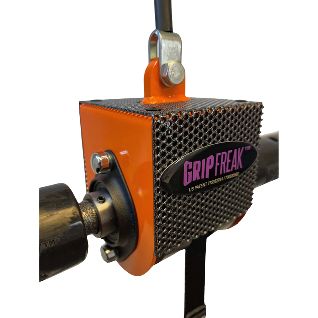 Close-up of the GRIP FREAK Fat Grip Wrist Roller Forearm Workout Tool - Plate Holder, showcasing its sturdy metal mesh surface and bold orange side panel for powerful forearm exercises.
