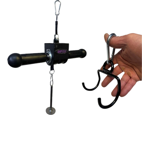 A hand holds a black metal hook; beside it is the GRIP FREAK Fat Grip Wrist Roller Forearm Workout Tool with a roller unit, weight plate holder, and dumbbell hook—ideal for grip strength and forearm workouts.