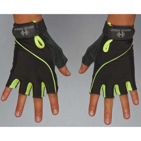Hands wearing HAULIN HOOKS GLOVES 'Womens' in black and neon green, featuring a fingerless design with adjustable straps for padded protection. These gloves are machine washable for easy maintenance.