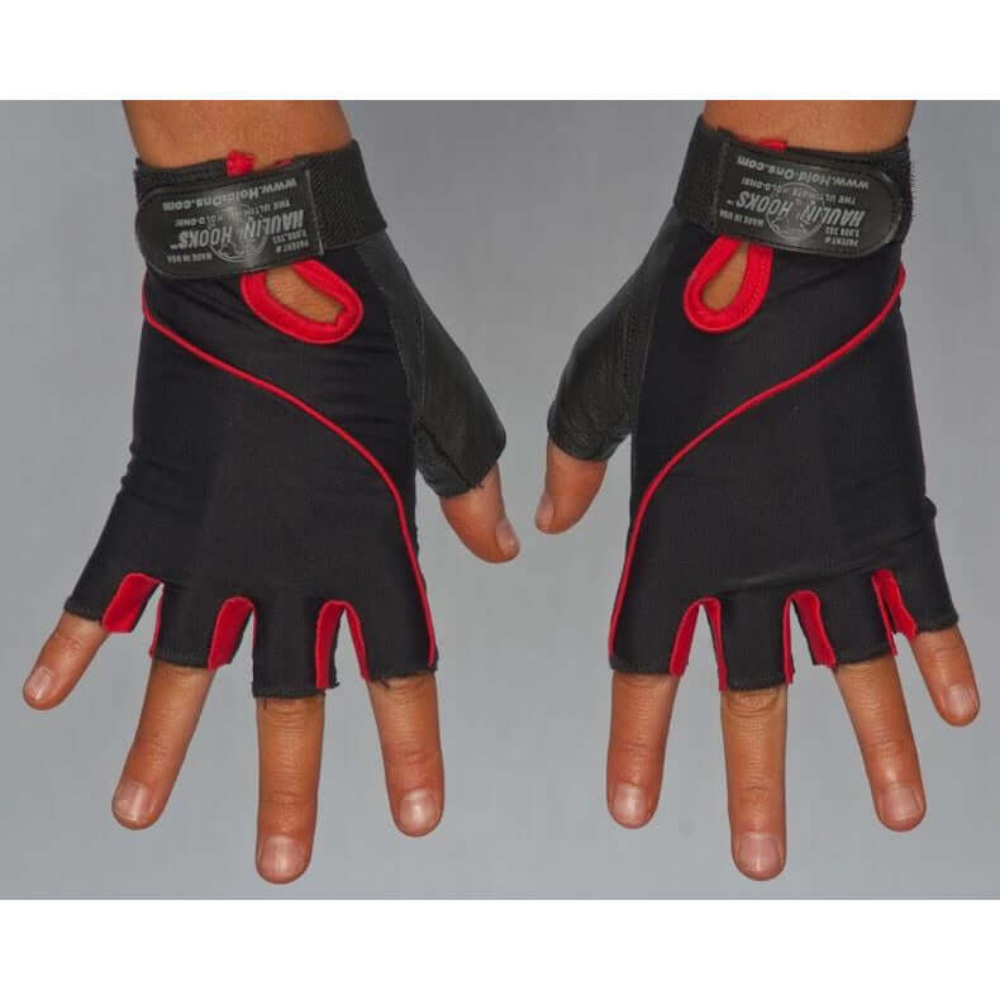 Two hands display HAULIN HOOKS GLOVES 'Womens' in black and red, featuring a fingerless design, Velcro straps, padded comfort for intense workouts, and easy machine washability.