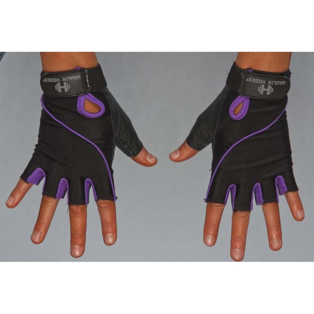 Two hands sport black and purple fingerless HAULIN HOOKS GLOVES 'Womens' with "Harbinger" branding on the wrists, providing padded protection for better grip. They're machine washable, making them ideal for fitness enthusiasts.