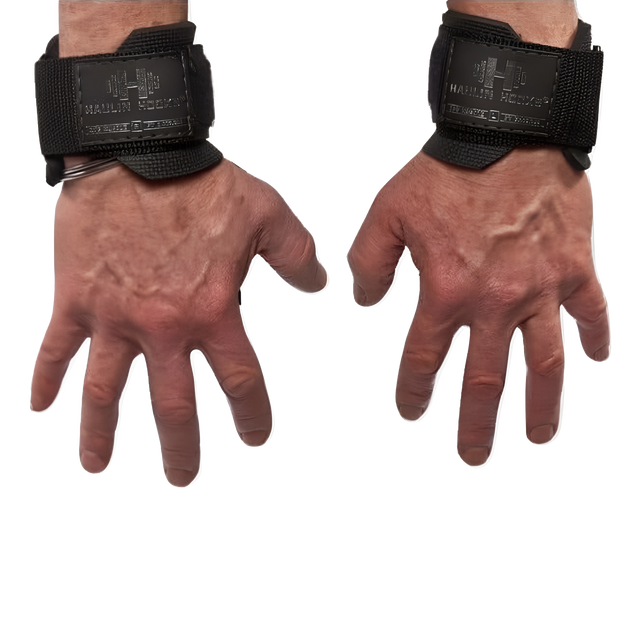 Two hands wearing HAULIN HOOKS 'ORIGINALS' Hooks for Weightlifting Extreme, perfect for deadlifts, with palms facing down against a white background.