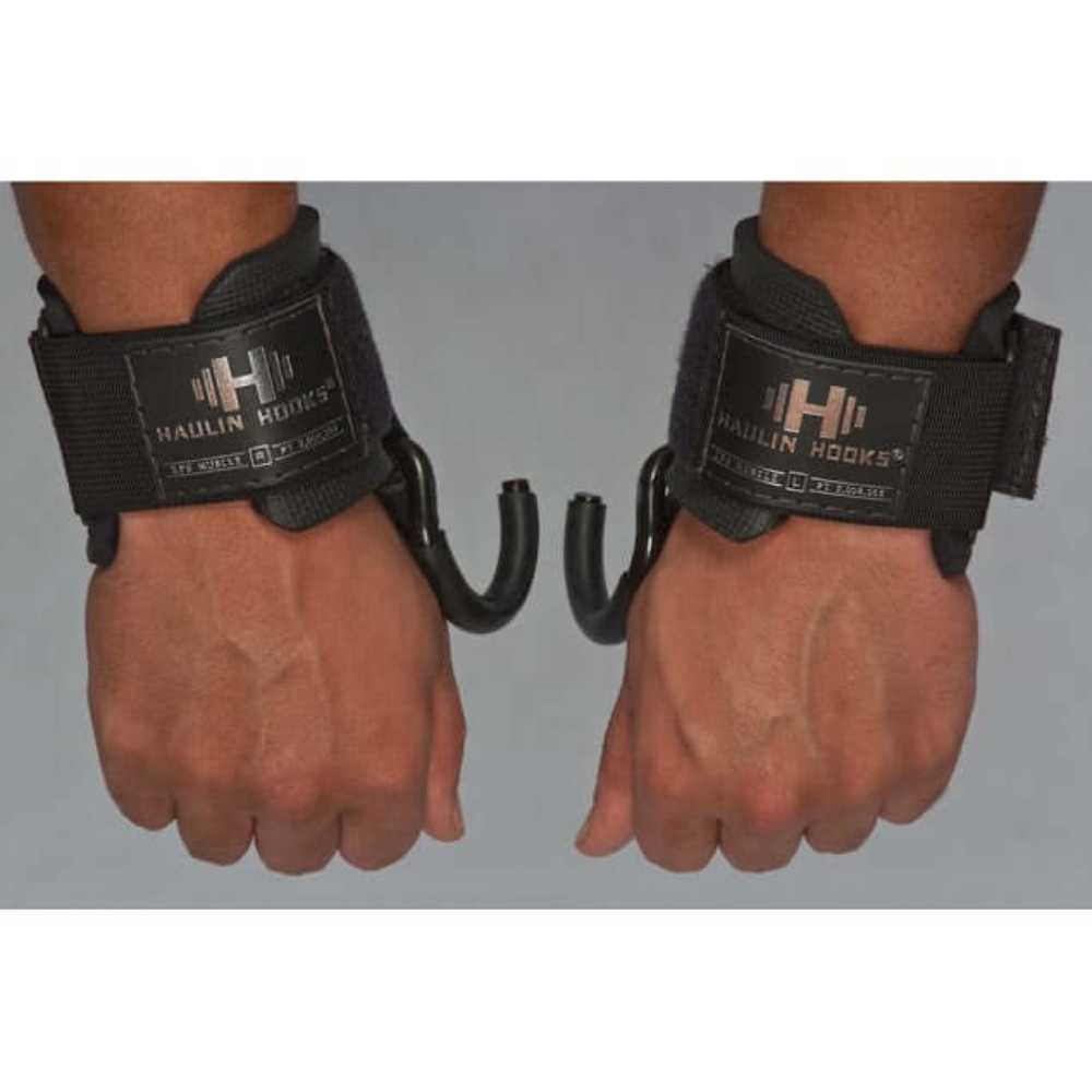 Two hands sporting HAULIN HOOKS 'PROFESSIONAL' in black, featuring neoprene wrist protection, ready for deadlifts.