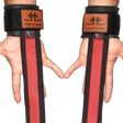 Two hands wearing black HAULIN HOOKS 'STRAPS 1000' heavy duty lifting straps with red accents and brown labels, ideal for extra grip during weightlifting wrist strap workouts.