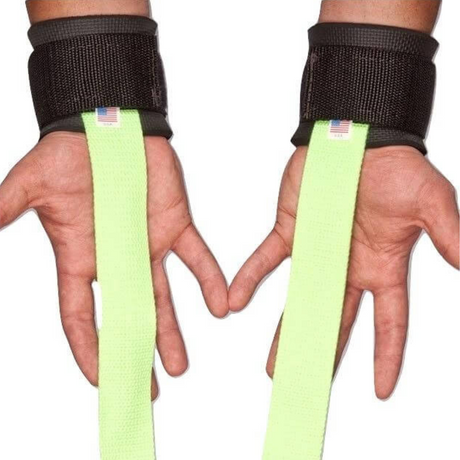 Hands are ready for weightlifting with HAULIN HOOKS 'STRAP 650', featuring USA-made neon green lifting straps and neoprene wrist padding.