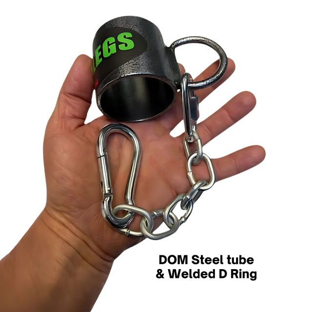 A hand holding the HOG LEGS 'Back Pac' LEGIT Cable Machine Attachments Set, featuring a metal cuff with chain and carabiner for versatile exercises on cable machines such as the lat bar or T-bar row.