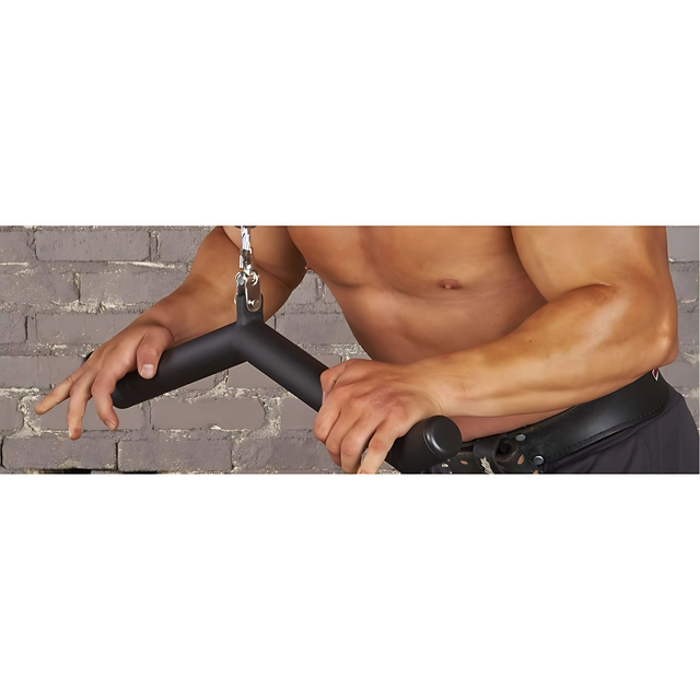 A shirtless person uses the HOG LEGS 'Ham Bone' FAT Cable Tricep Bar Extreme! for muscle stimulation against a gray brick wall.