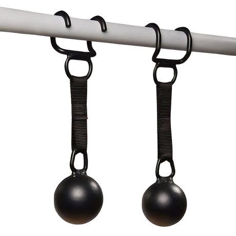 Two HOG LEGS 'Raging Boar' Pull-Up Grips, black balls with straps, hang from hooks on a horizontal bar—ideal for building grip strength and working back muscles.