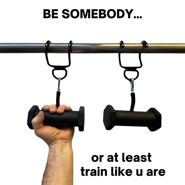 A hand grips a PULL FORCE GEN2 Handle for Pull up Bar, attached to a metal bar with hooks and carabiners, enhancing muscle stimulation.