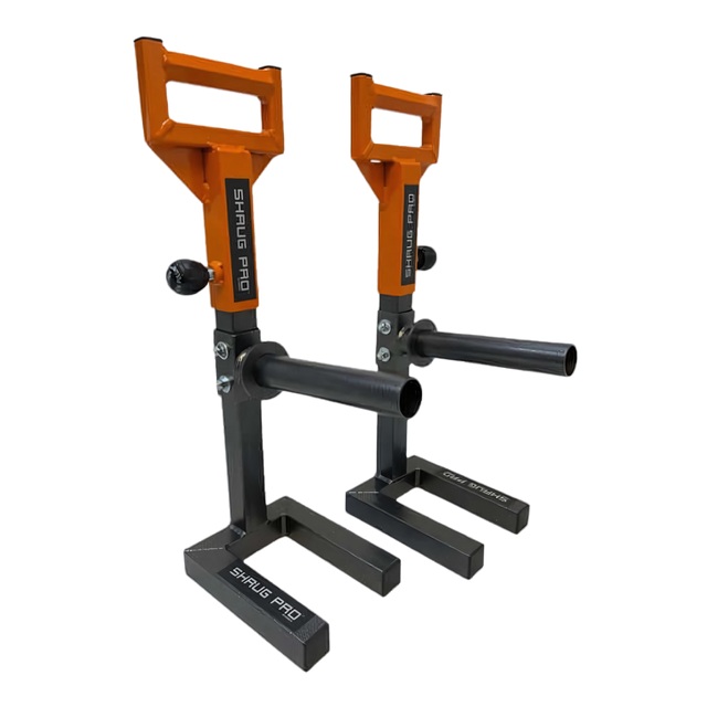 Two black and orange SHRUG PRO Freestanding Hex Bars, a trap bar barbell shrug alternative without rollers, featuring patented metal foot bases and adjustable handles, isolated on a white background.