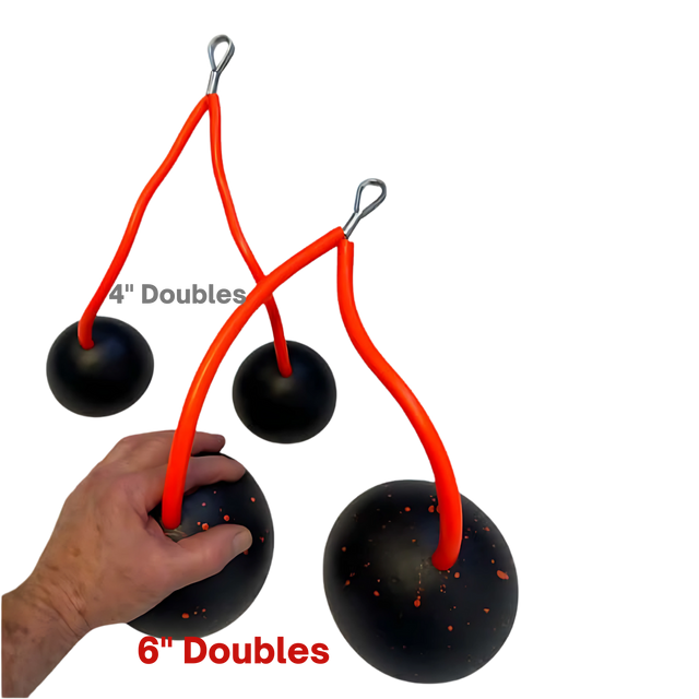 A hand holds the TRIBELLS 6" Palms Grip Tricep attachment, with 4" doubles visible behind; all feature red ropes, black balls, and a hygienic design—perfect for workouts that outdo dumbbells!.