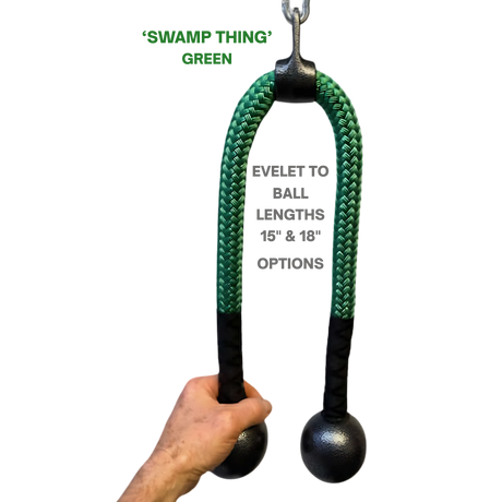 A hand holds the green USA Made TRICEPS ROPE CABLE Extreme Performance Viper / Twisted Sisters with black ends and two "Swamp Thing" weighted balls, offering top performance and various size options.