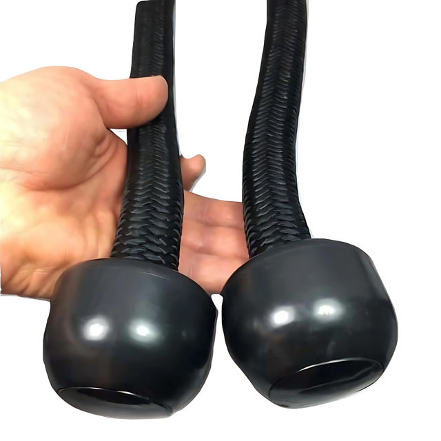 A hand holding two TRICEPS ROPE EXTREME 'Singles' triceps cable workout ropes with textured, cushioned grips and rounded ends—ideal for effective triceps exercises.
