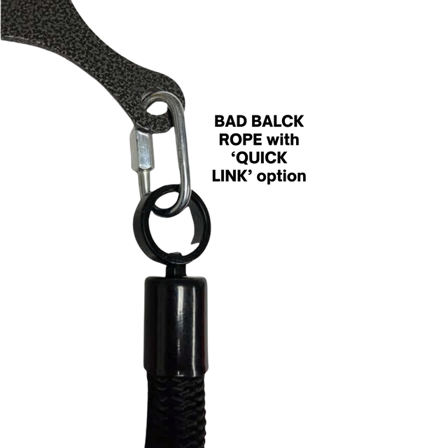 Close-up of a metal clip on a black cord and textured bracket, part of the Tricep Rope Dynamic TRD Cable Attachments for Gym Yoke, designed to enhance muscle activation during workouts.