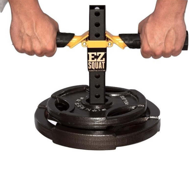 Hands firmly gripping an EZ SQUAT Combo Pac, ready to tackle the next challenge with confidence.