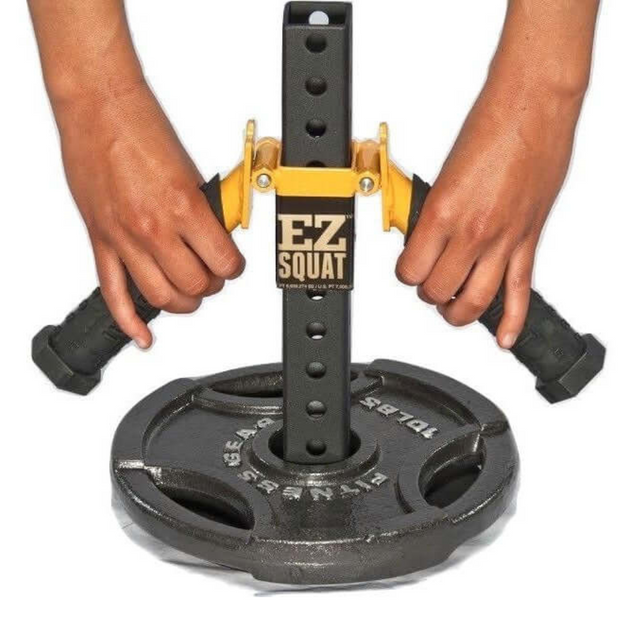 Hands adjusting an EZ SQUAT Combo Pac handle attached to an Olympic Weight Plate for glute exercises.