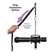 The GRIP FREAK Fat Grip WRIST ROLLER is grasped by a hand ready to activate the "Strap Suspension System." By pulling and lifting, this system enhances grip torque, boosting strength and control.