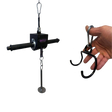 A hand grips the GRIP FREAK 'Slip Grip' Brutal Hand Grip Strengthener, a black tool with handles and metal attachments—perfect for grip targeting or an intense forearm workout.