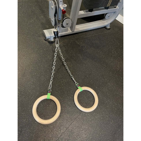 Gymnastic Rings Cable Machine Handles elegantly replace standard handles on the gym floor, adding a versatile twist to your workout routine.