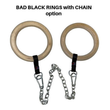 Two gymnastic rings serving as cable machine handles, connected by metal chains, can be labeled "BAD BLACK RINGS with CHAIN option.