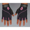 Someone wearing HAULIN HOOKS GLOVES 'Womens' in black and pink with padded protection against a gray background.