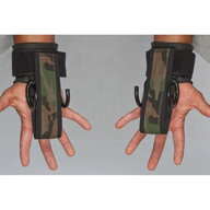 Two hands wear HAULIN HOOKS 'PROFESSIONAL,' neoprene wrist protection straps in camo pattern, with durable hooks facing outward.
