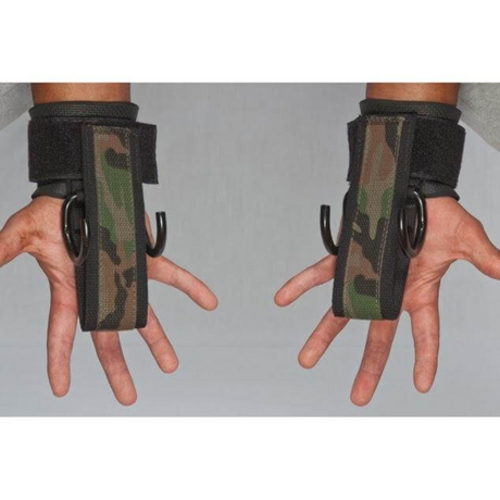 Two hands wear HAULIN HOOKS 'PROFESSIONAL,' neoprene wrist protection straps in camo pattern, with durable hooks facing outward.