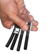 A hand holds four HAULIN HOOKS ONLYS with black handles in a clear plastic bag, designed for wrist protection and precise muscle isolation during detailed work.