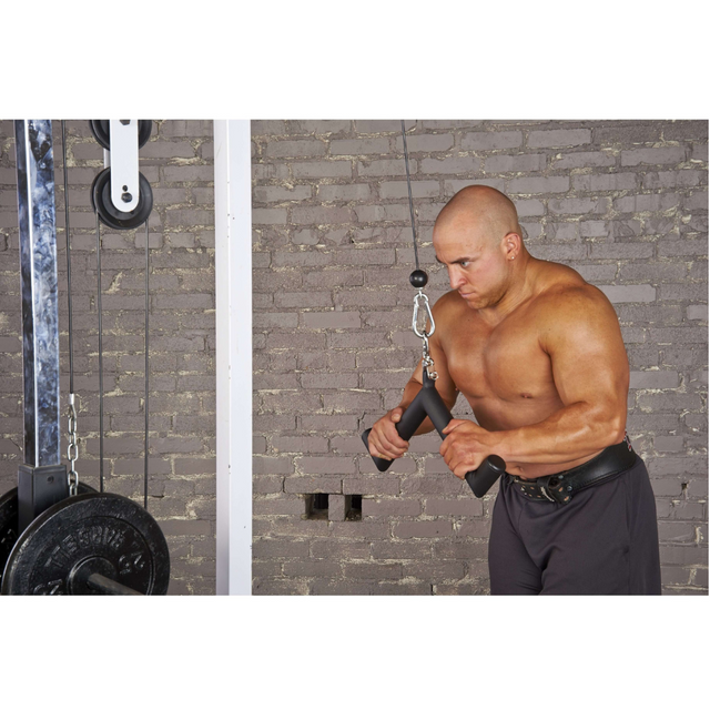 A man is using Hog Legs 'Hog Wild' Workout Cable Attachments gone Fat! at the gym to enhance muscle stimulation during his tricep exercises.