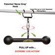 The HOG LEGS Hog Balls Upper Body Exercise Equipment Bar is a black bar with round ends, hanging from a chain and clip on a white bar—ideal for upper body workouts. Text reads "EXTREME 'LIVE ACTION'".
