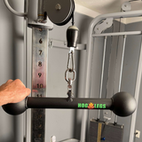 Using the "HOG LEGS Hog Balls Upper Body Exercise Equipment Bar," a user focuses on enhanced muscle recruitment for an effective upper body workout. Its commercial-grade build ensures a seamless and robust gym experience.