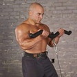 A shirtless man in a weight belt maximizes muscle stimulation with HOG LEGS 'Hog Wild' Workout Cable Attachments gone Fat! while doing cable curls in front of a brick wall.