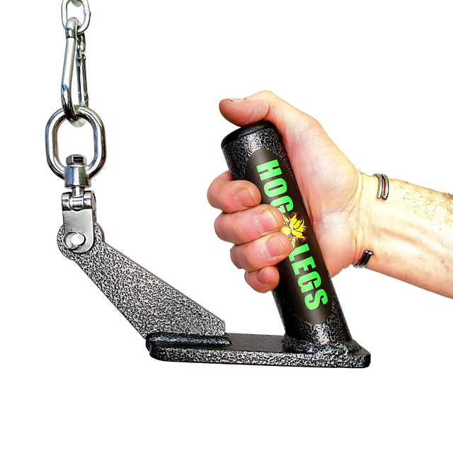 A hand grips a HOG LEGS Jawbone Single Fat Grip Cable Machine Handle, black, attached to a metal chain and bracket.