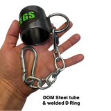 A hand grips the HOG LEGS Jawbone Single Fat Grip Cable Machine Handle, featuring a chain and carabiner—perfect for single arm cable row exercises.