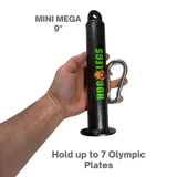A hand holds a black "HOG LEGS Weight Load Pins / Weight Plate Holders" grip, labeled "Mini Mega 9”," with text: “Hold up to 7 Olympic Weight Plates.” Ideal for serious strength training and compatible with any load pin.