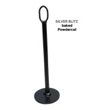 The HOG LEGS Weight Load Pins are black metal stakes with a circular base and oval top loop, designed for strength training and compatible with Olympic weight plates as weight plate holders.
