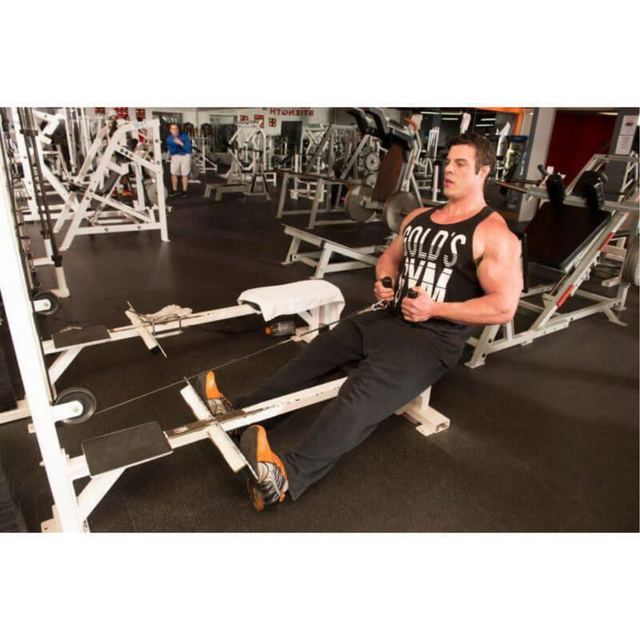 A person is exercising on a rowing machine in a gym, using HOG LEGS Multi-Row 'Wide' Back Cable Exercises Handles to enhance their upper body workout.