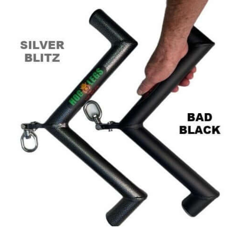A hand holds two bike handlebar grips labeled "SILVER BLITZ" and "BAD BLACK," reflecting the precision of the HOG LEGS 'Pork Chop' Killer Triceps Workout Cable Bar in their perfect design.