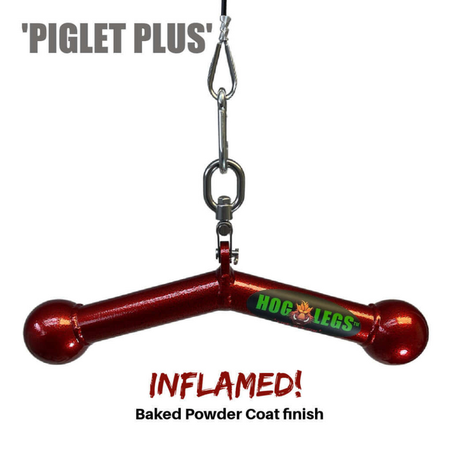 The HOG LEGS 'Piglet Plus' Triceps Bar features a red metal exercise handle with the "Hog Legs" logo and an "Inflamed! Baked Powder Coat finish," designed for optimal muscle stimulation and triceps targeting.