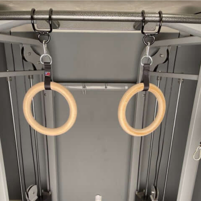 HOG LEGS Pull Up Hooks for Exercise Cable Attachments are used in gyms, attaching securely to a metal frame with their patented design.