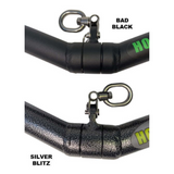 Close-up of two paddles with metal connectors labeled "Bad Black" and "Silver Blitz," designed for workout stimulation, akin to the HOG LEGS 'SubPrimal' EZ Curl Bar / Triceps Workout Bar.