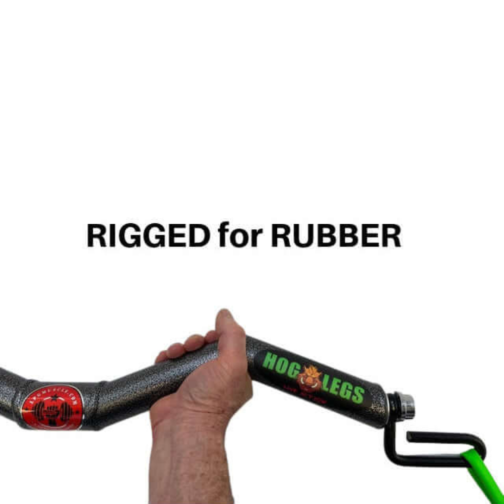 A hand grips the textured gray handle with "Hog Legs" text and "RIGGED for RUBBER" boldly displayed on a clean white background. The HOG LEGS Subprimal D/L Bands or EZ Bar Cable Attachment is expertly designed for optimal biceps, triceps, and forearm bar workouts.