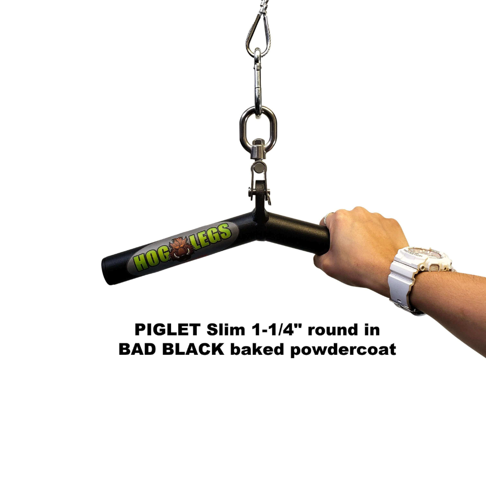 A hand holds a black HOG LEGS Wicked 'Piglet' Tricep Bar Workout handle, paired with a white watch, providing commercial-grade muscle stimulation perfect for triceps targeting.