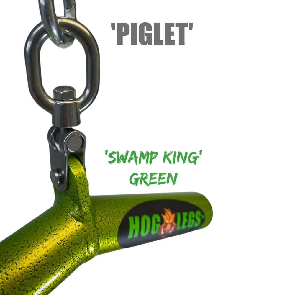 Close-up of a green metal tool labeled 'HOG LEGS' and 'PIGLET,' with 'SWAMP KING' above, highlighting its commercial-grade design for muscle stimulation. Product: HOG LEGS Wicked 'Piglet' Tricep Bar Workout gone FAT!.