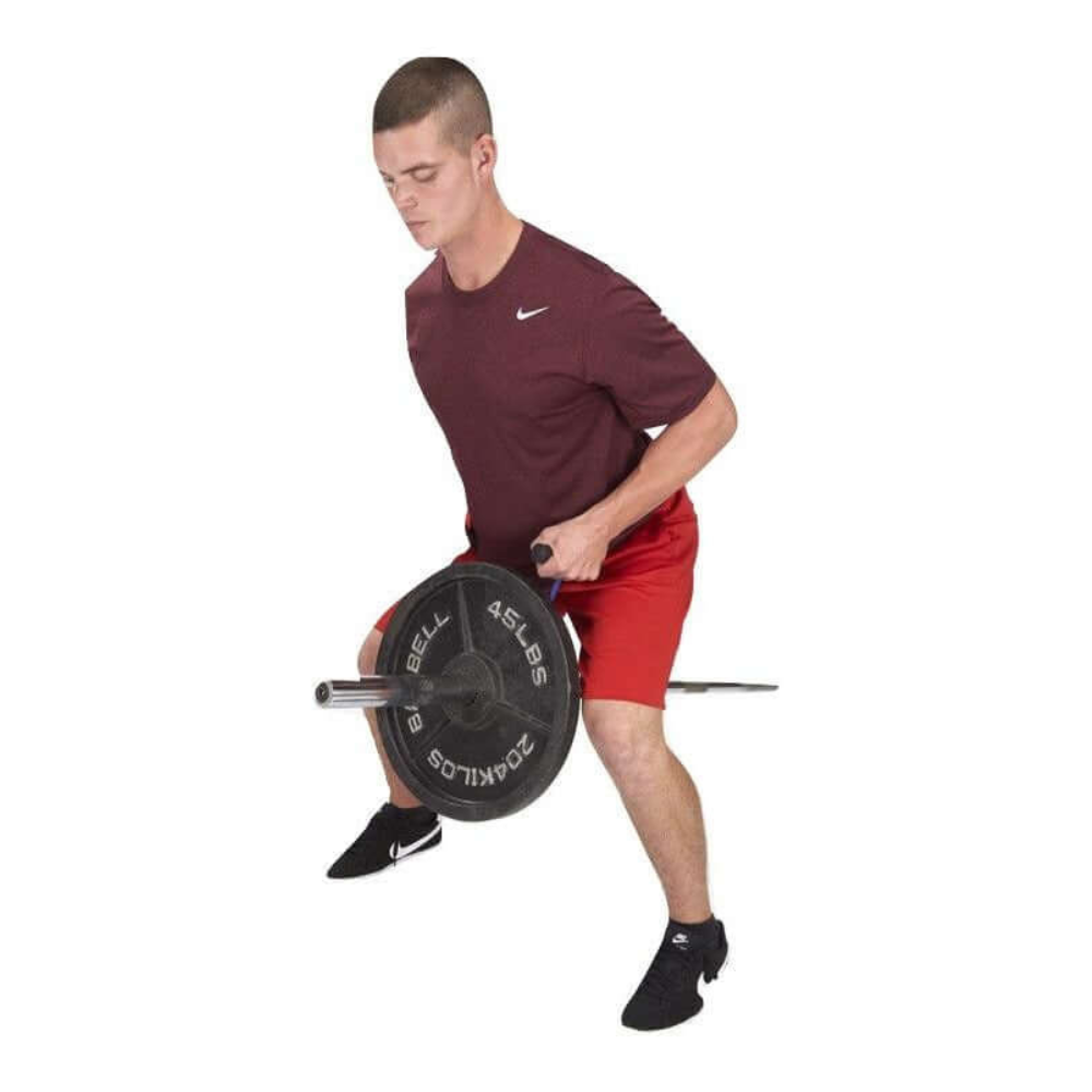 A man in a red shirt and shorts is performing a weightlifting exercise with a barbell, using the PULL FORCE 'Combo' T Bar & Seated Cable Row Alternative for added stability.