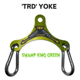 The PULL FORCE Mini Multiplier Home Gym Cable Machine Yoke in Swamp King Green features two metal clips, is compatible with dual cable machines, built for durability, and comes with a lifetime replacement warranty.