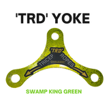 A green yoke labeled “PULL FORCE Mini Multiplier Home Gym Cable Machine Yoke” with “SWAMP KING GREEN” below, designed for dual cable machines and covered by a lifetime replacement warranty.