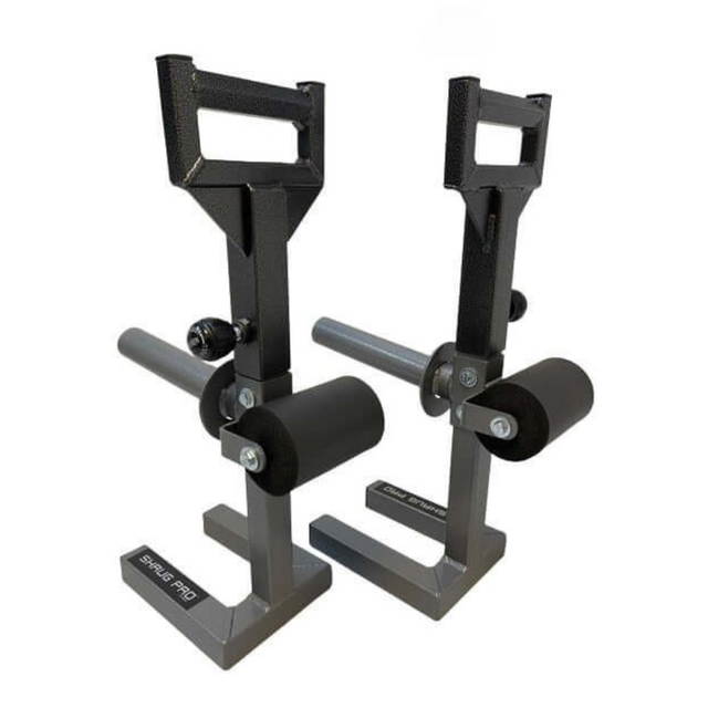 Two gray "SHRUG PRO" attachments with black padding are displayed on a white background, perfect for integrating with your existing farmers walk platform.