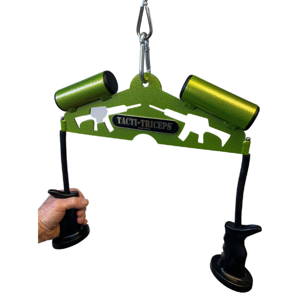 The TACTI – TRICEPS Double Wide 'Super Set' Tricep Attachment Yoke is a green tactical-themed tricep bar with black grips, crafted from commercial-grade materials and depicted with a hand holding one handle.