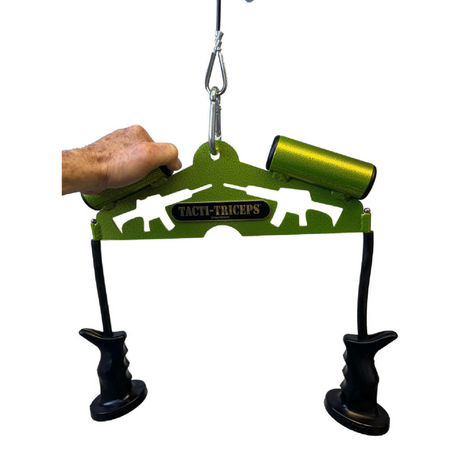 Someone holding a TRICEPS TRIBULATION Cable Machine Attachment Set, featuring green exercise attachments with pistol grip handles.